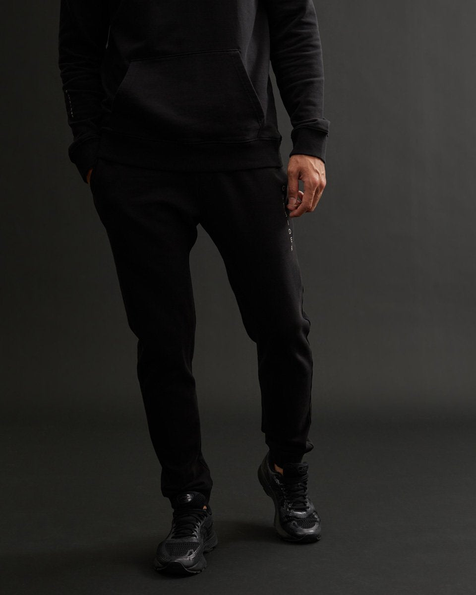 Fitted Classic Outsider Sweatpants with Minimal Text Graphic